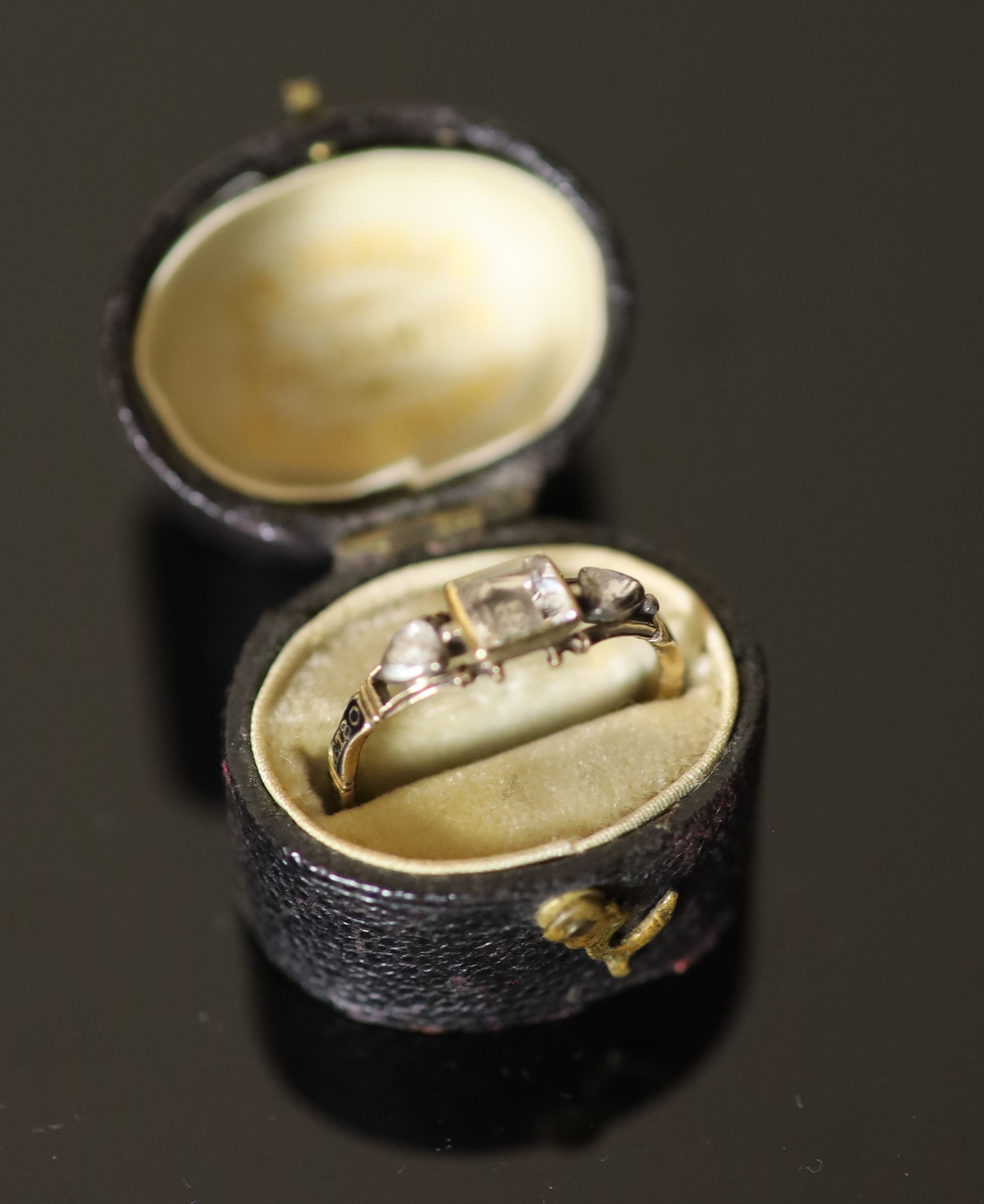 An early George II gold, rock crystal rose cut diamond and black enamel memento mori ring,